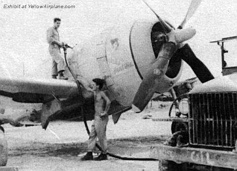 Refueling a P-47 Thunderbolt before the escort mission in WW2 over Japan.