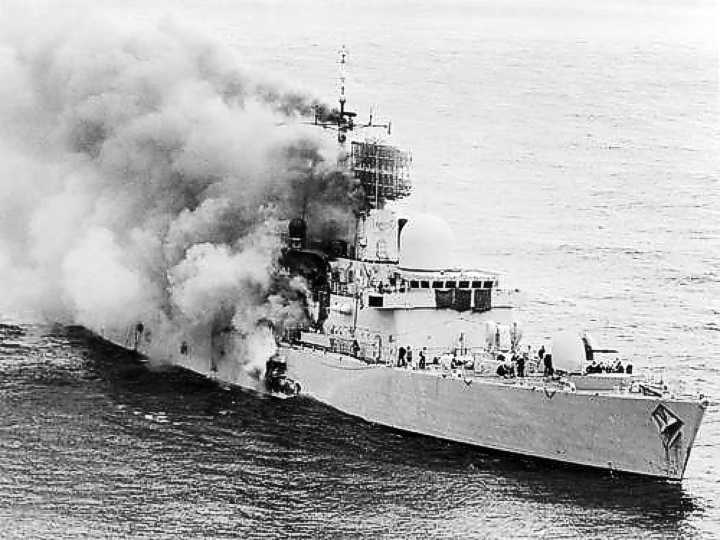 HMS Sheffield Destroyer burning after being hit by an Exocet Missile
