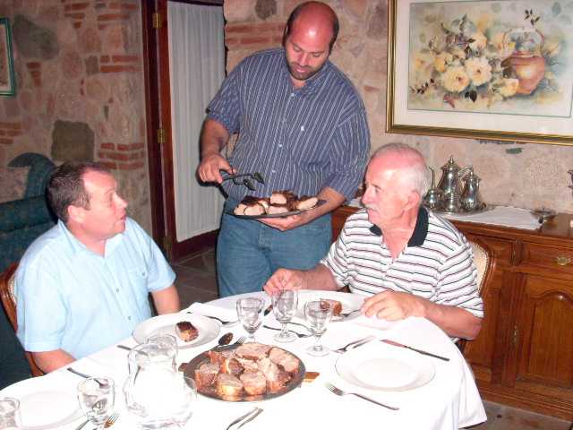 Mariano Velasco and Neil Wilkinson eating lunch in Argentina