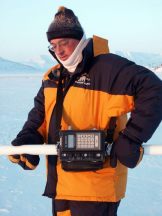 Rhett Herman holding the EM-31 Ice Thickness Tester.