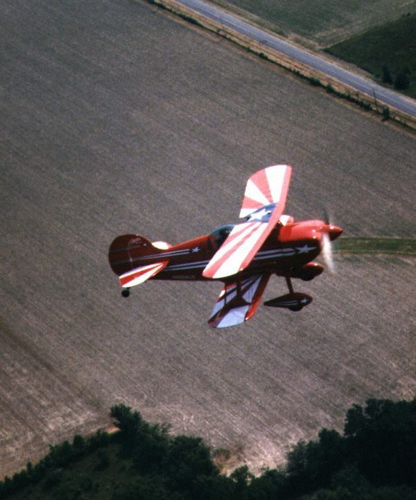 Photo of Carlos Santaigo flying his Pitts Airplane near Smith Airport, Illinois.
