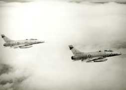 Two F-100 Super Sabres on their way to the target in Viet Nam