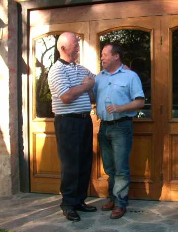 Mariano Velasco shaking hands with Neil Wilkinson