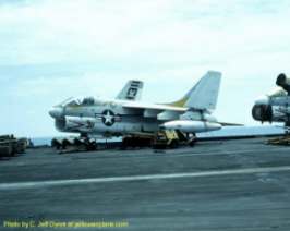 A picture of an A-7 Corsair II on the deck of the USS Kitty Hawk, CV-63