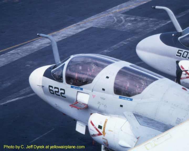 EA-6B Prowler next to the conning tower of the USS Kitty Hawk CV-63