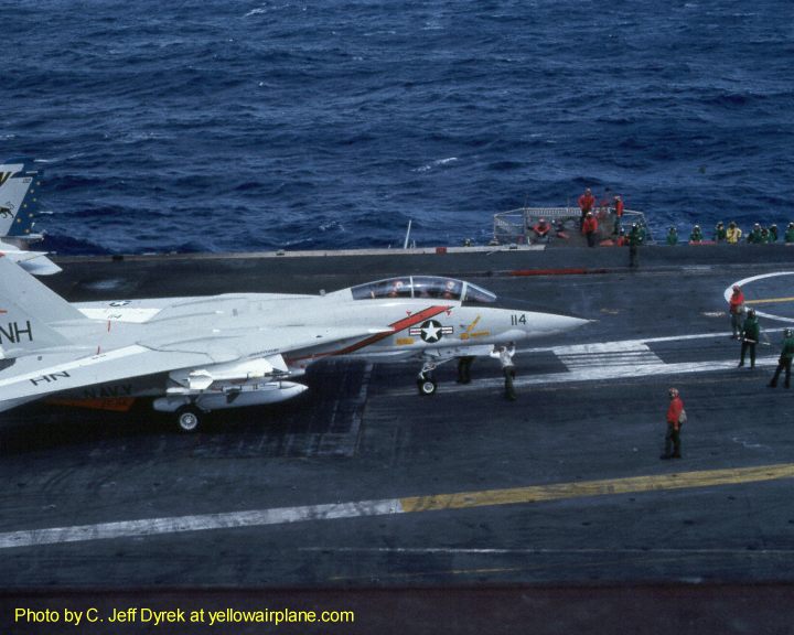 this is a great photo of a Grumman F-14 tomcat one of the greatest aircraft carriers, the USS Kitty Hawk