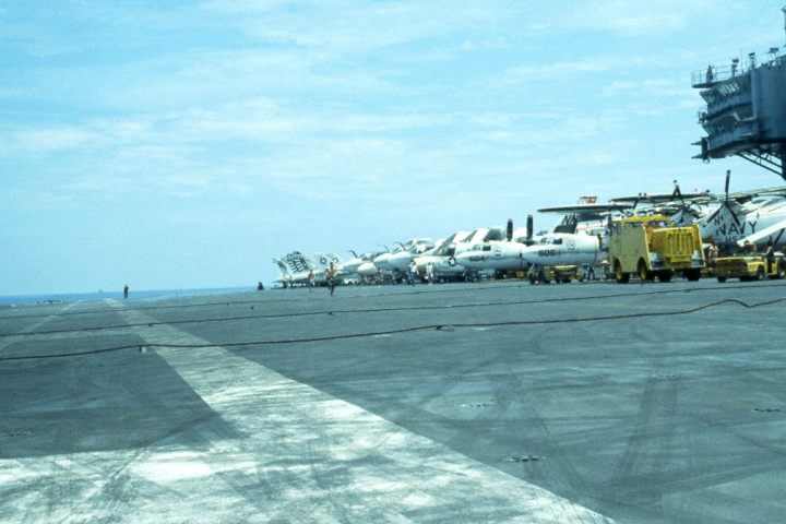 Arresting wires are visible while looking down the angle deck of the USS Kitty Hawk Aircraft Photo