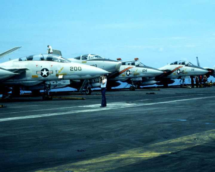 F-14 Tomcats and an A-3 Skywarrior (Whale) on the deck of the USS Kitty Hawk