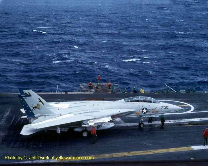 a grumman f-14 tomcat from VF-213 the black lions on the USS Kitty Hawk