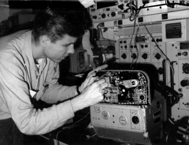 Brad Jones at work on a Chicago  Aerial Industries Serial Frame Camera aboard the USS Kitty Hawk in the Tonkin Gulf of of Viet Nam