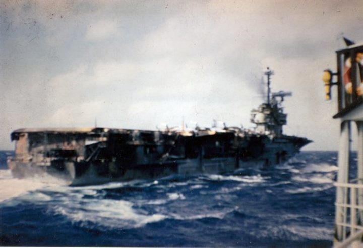 British Navy Ship, Tidesurge photographs the USS  Forrestal Fire