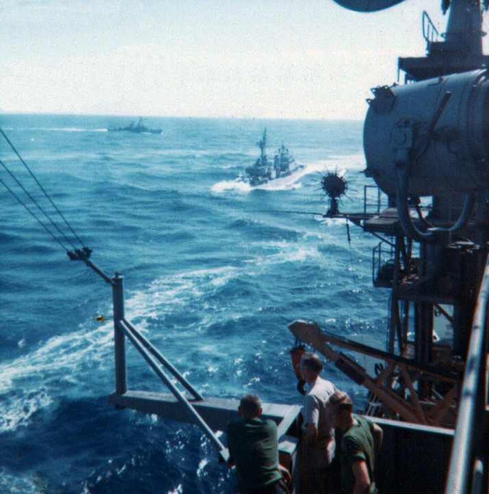 The US Navy Destroyer DD 869 approaches the tanker for refuleing