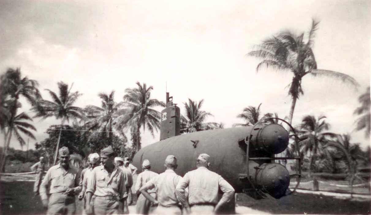 Japanese Mini Sub on Guam with American Soldiers taken by Hein Loopstra in WW2